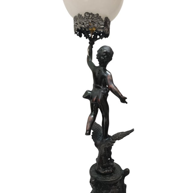 Vintage Torch Lamp in Metal, in Good conditions. Designed 1890 to 1919 European Plug (up to 250V).The wiring of this item...