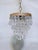 Add an exquisite layer of mid-century romance and shimmering brilliance to your home with this vintage petite crystal...