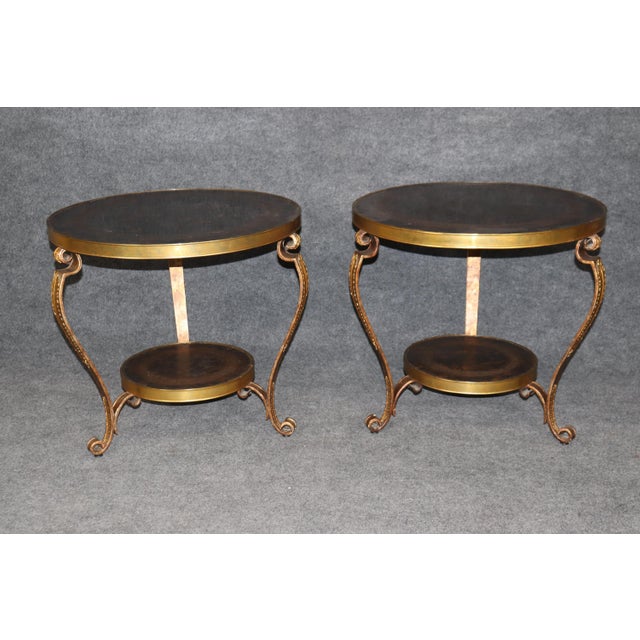 This pair of solid brass or bronze patinated gueridons by the renowned Century Furniture Company reflects superior...