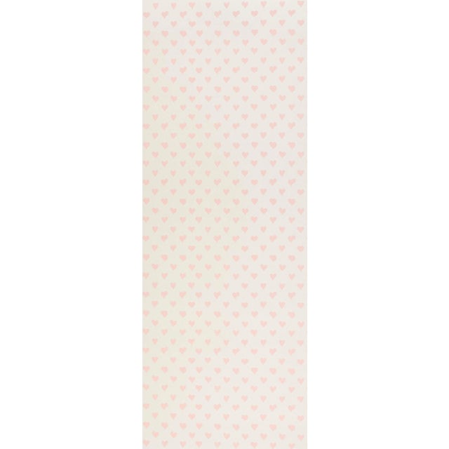 This sweet and happy wallcovering features an irresistible heart motif based on an original block-print created by English...