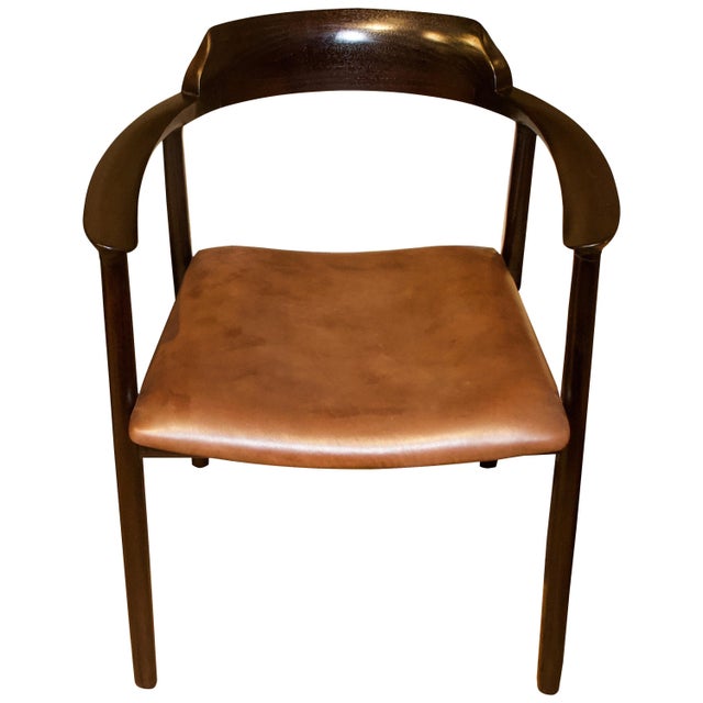 Beautiful curved back rest with a classic leather seat. Pair available. Price reflects one. Andrianna Shamaris. The Leader...