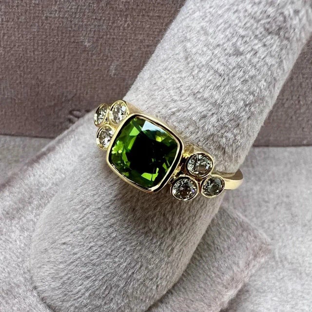 Created in 18 karat yellow gold Peridot 2.30 carats approx. Diamonds 0.35 carat approx. Ring size US 7, can be sized...