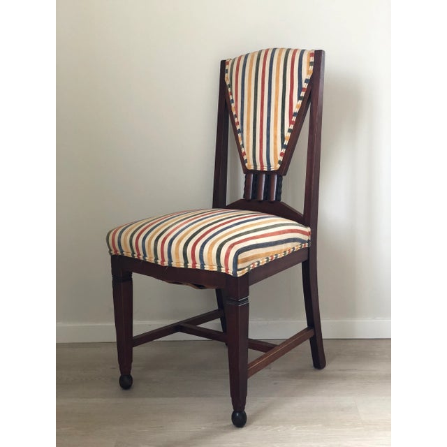 This set of four unique Art Deco Amsterdam School chairs, crafted with high-quality craftsmanship in the Netherlands in...