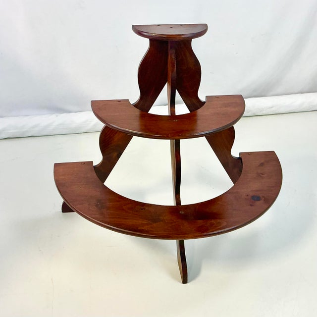 This hand-made Americana Folk Art Pine Plant Stand is a great find. It features a dark stain on the pine planks and has 3...