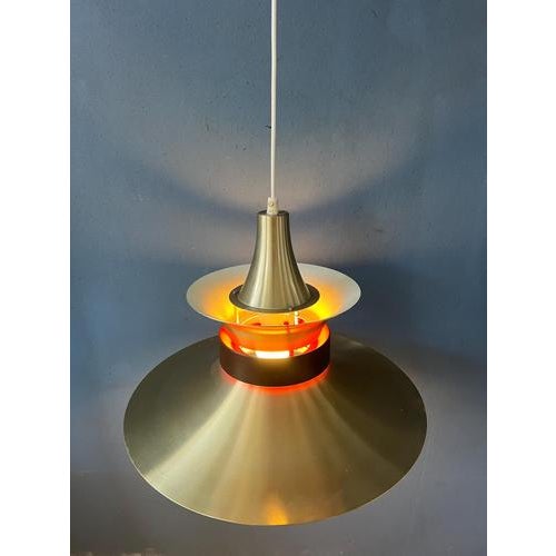 Beautiful large danish mid century pendant lamp. The piece is made out metal and has refined silver finish. The orange...
