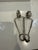 This is a vintage French (1960-1950) stainless steel escargot plate set featuring a 6-hole dish and matching tongs for...
