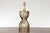 A Midcentury Modern Italian Brass hourglass shaped table lamp with single socket and newly and professionally rewired for...