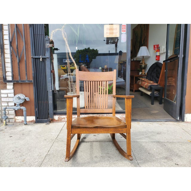 Early 1900s quarter sawn oak rocking chair. Great looking, Arts and Crafts style rocking chair, probably made during the...