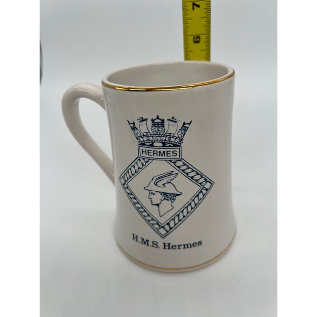 This vintage mug is a must-have for any military collector or navy enthusiast. Gilt accents on a white field with navy...