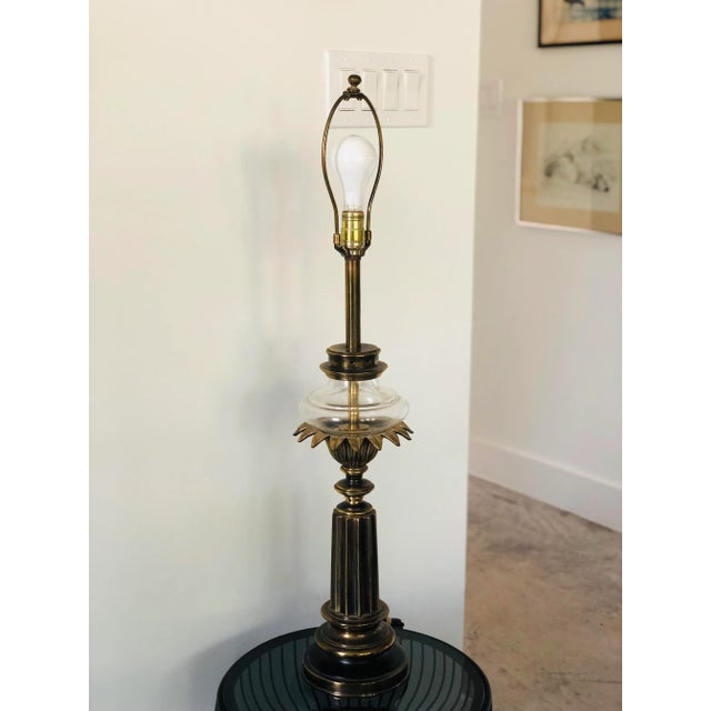 This Stiffel starburst is robust. Tall, heavy, and gorgeous, it's vintage oil-lamp style, nestled into a brass bloom and...
