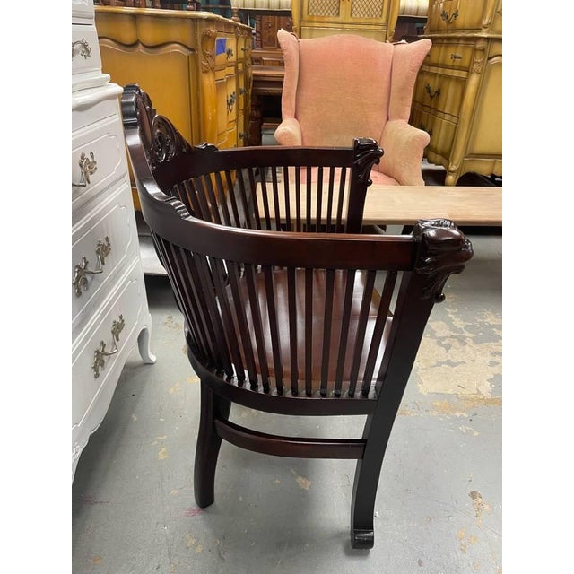 Beautifully refinished antique arm chair. It is made of solid rosewood and finished in a way to really display the natural...