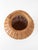 A vintage wicker vase featuring a sculptural basket-form silhouette and finely woven reed construction. The rounded body,...