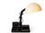 Vintage desk lamp from the 1970s and 1980s made from a combination of plastic and metal, serving as a storage place for...