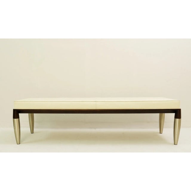 Giorgetti Roi Leather Bench. Made in Italy. Designed by Chi Wing Lo. The bench is saddle leather with a solid maple base...