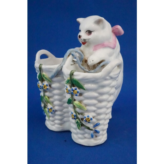 Description of the item: Small, delightful hard-paste porcelain sculpture, polychrome, entirely decorated by hand and...
