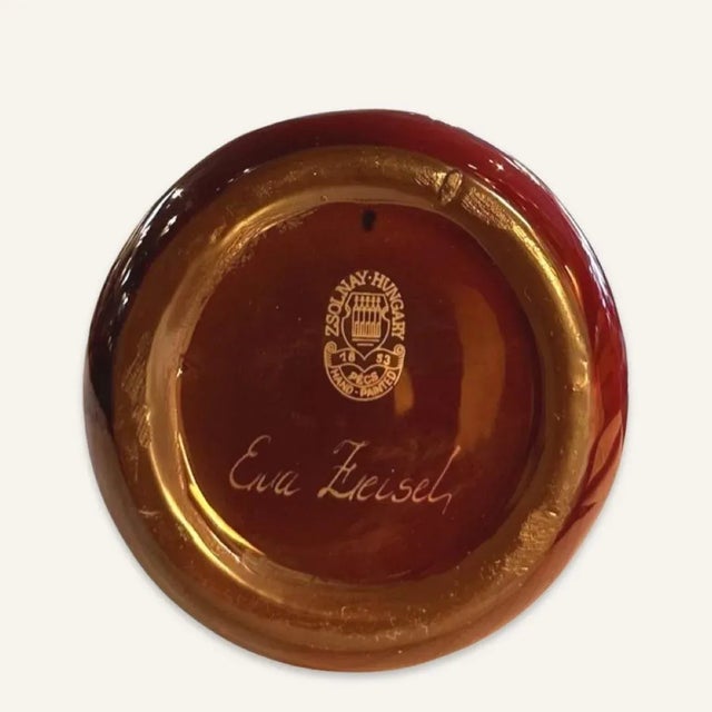 Eva Zeisel 1990s Eva Zeisel Small Red Iridescent Glaze Porcelain Zsolnay Vessel With Gold Overtones For Sale - Image 4 of 5