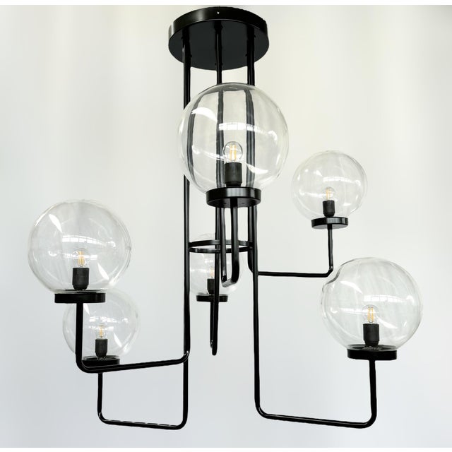 Italian modern chandelier or flush mount with six Murano glass globes arranged in six tiers mounted on matte black metal...