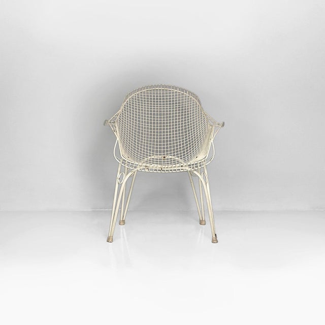 Italian white iron outdoor chair, 1950s White-painted iron outdoor chair, characterized by a light and airy structure...