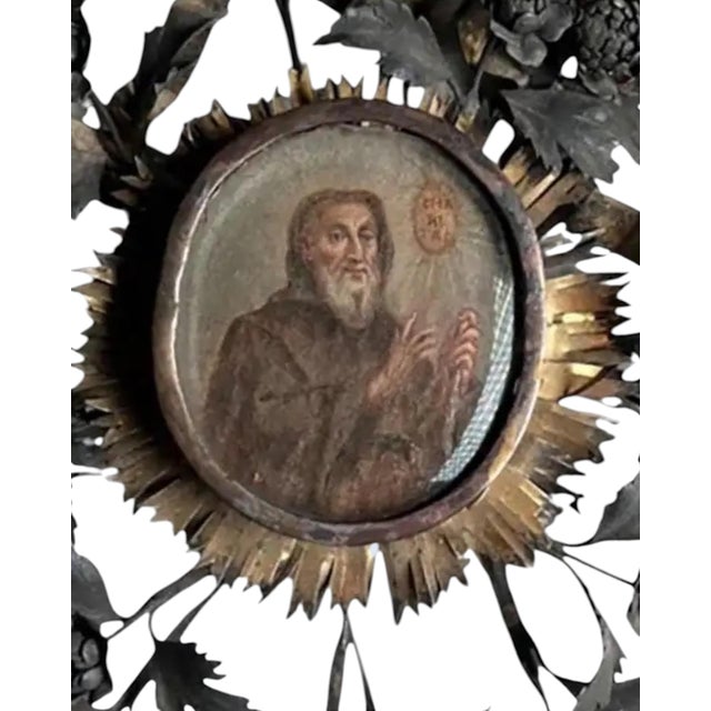 An important 18th century European devotional painting depicting a saint, presented in an ornate silver mounted frame. The...