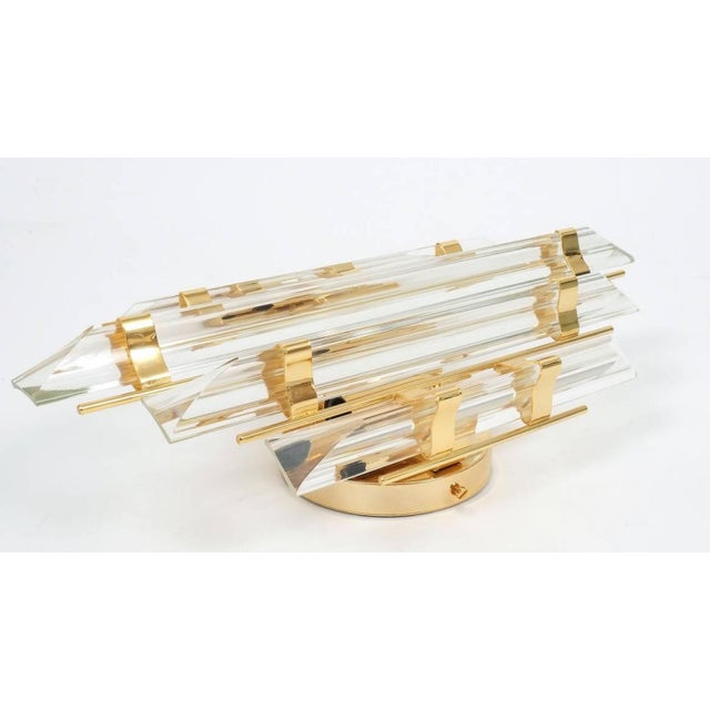 1 of the 11 Murano glass wall sconces featuring five long crystal clear glass "triete" prism-rods, with gold-plated...