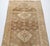 Vintage Oushak Runner – Muted Anatolian Wool with Diamond Medallions in Beige, Tan, and Soft Brown This elegant vintage...