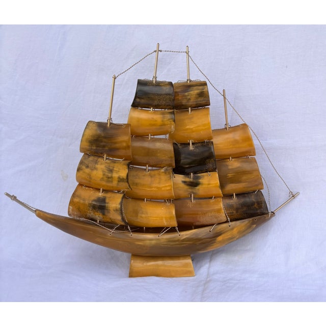 This vintage mid-century Italian nautical folk art model clipper ship handcrafted from genuine cow or bull horn....