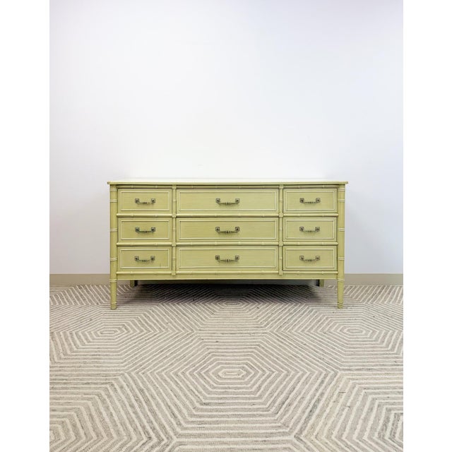 Make a statement with this vintage Henry Link “Bali Hai” 9-drawer dresser, complete with matching mirror. Finished in a...