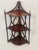 Super cute carved wood corner display etagere in 3 tiers.