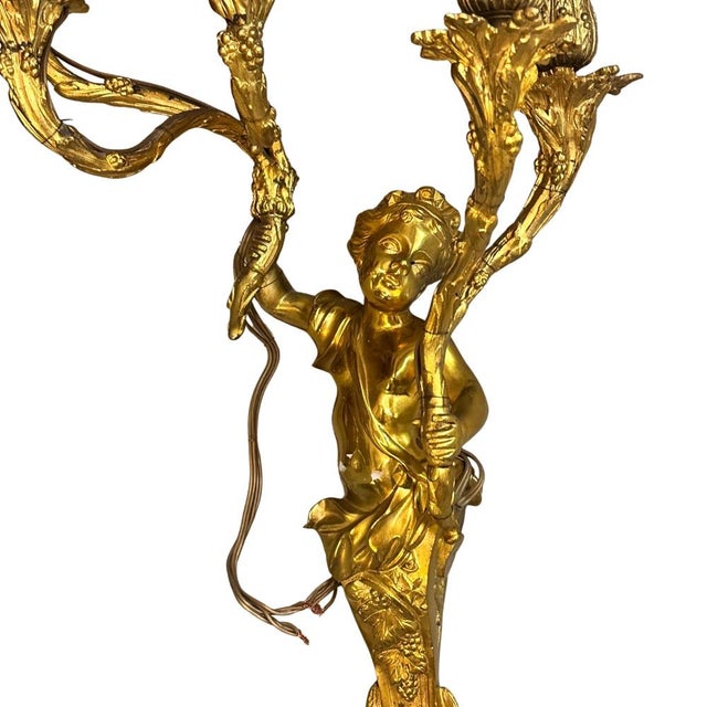 Cherub wall sconce, ormolu, louis xv style, napoleon iii period, late 19th century - france material: ormolu, crystal...