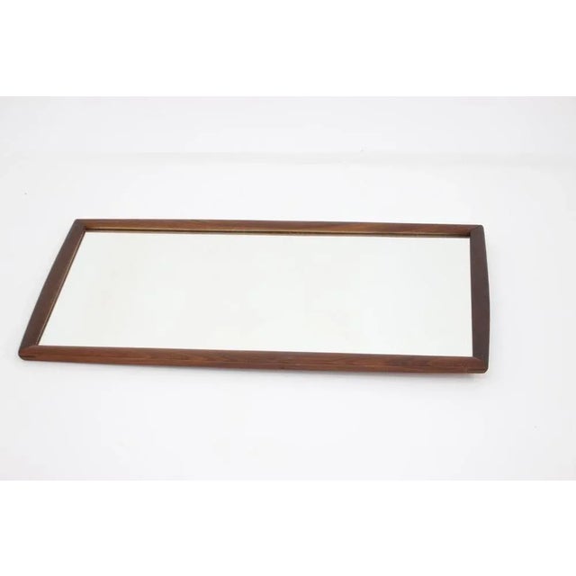 - Good original condition with minor signs of wear. - Frame made of teak wood. Wear consistent with age and use.