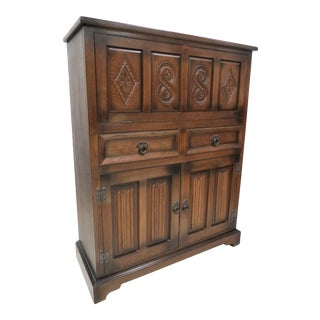 Vintage English Wood Bros. Carved Oak Cocktail Cabinet For Sale