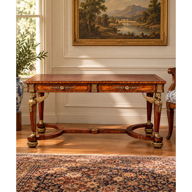 This remarkable vintage partners desk by Maitland Smith showcases the grandeur of the French Empire style, reinterpreted...