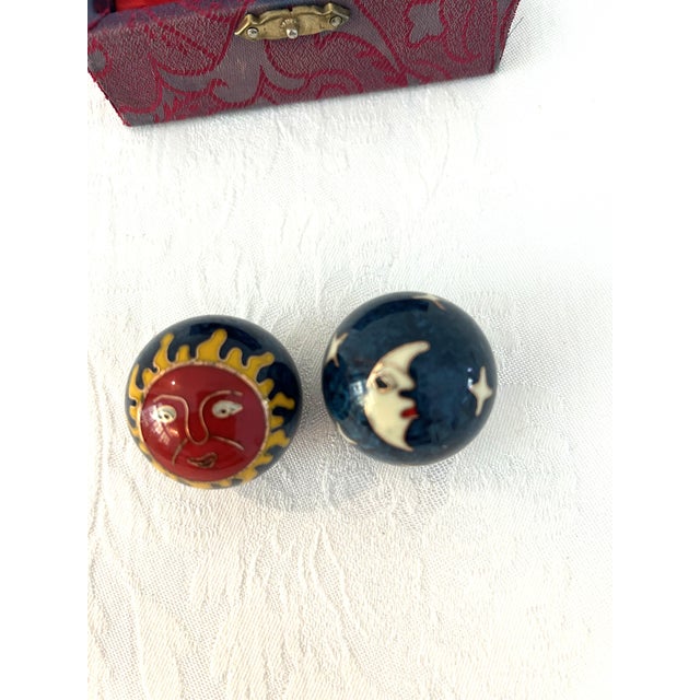 Lovely pair of 1980s cloisonne chiming Chinese Baoding therapy balls in a celestial motif. Chinese therapy balls,...