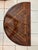 A beautifully crafted three‑leg demi‑lune game table featuring an intricate marquetry inlaid top with geometric motifs and...