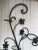 Wrought iron floral garden wall decor. Whimsical with leaves and grapes for three potted plants. 4 inch diameter opening....