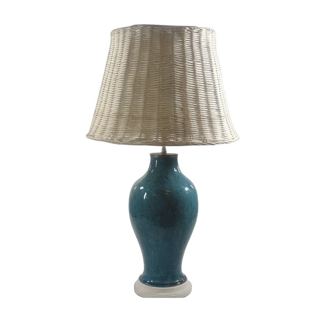 Chinese aqua glazed lamp with shade having incised dragons, also from the Susie Hilfiger estate. Measurements are 29"...