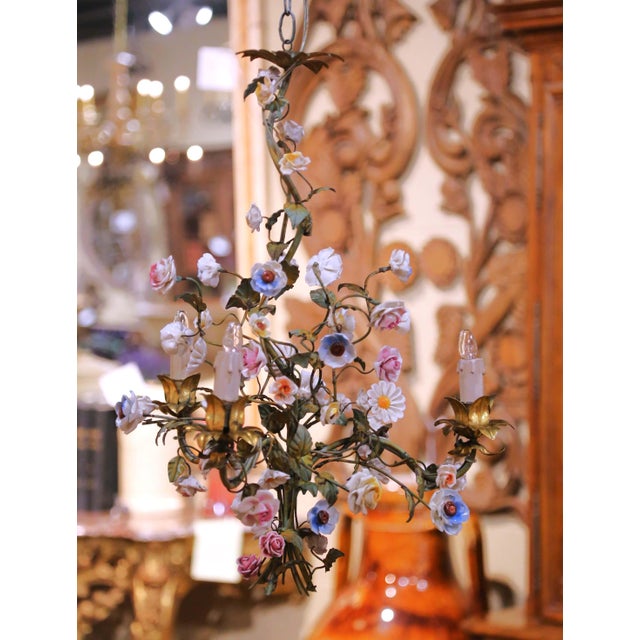 Place this elegant antique chandelier in a powder room, bedroom, or entry to bring a touch of whimsical French charm....