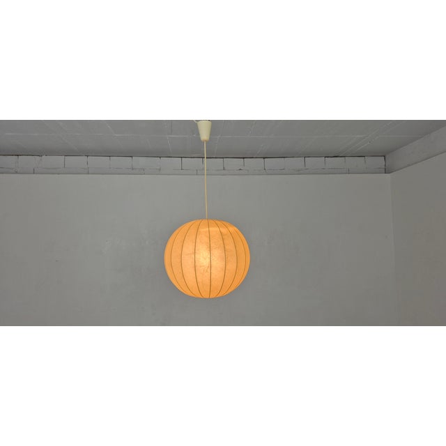 Italian Cocoon ceiling lamp from the 1960s. European Plug (up to 250V).The wiring of this item may be original and might...