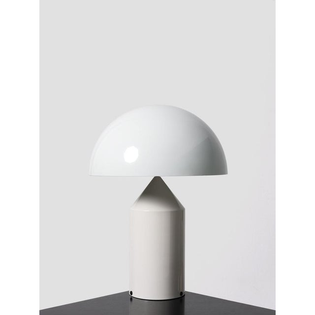 This is perhaps Vico Magistretti’s most famous lamp. The Oluce Atollo table lamp consists of two main parts. Firstly, the...