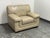 Design Plus Gallery presents a Lounge Armchair from Zhejiang Trayton Co. Beige leather upholstery is accented by...