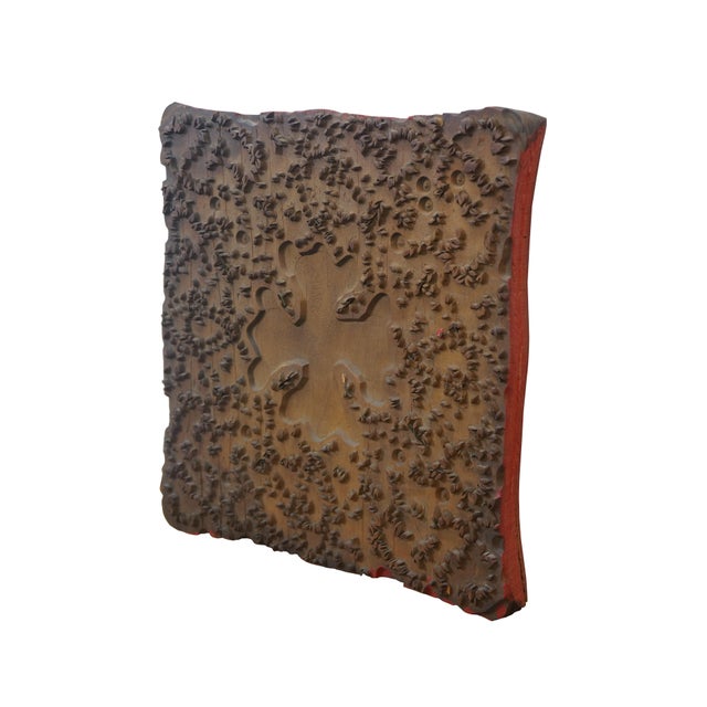 Antique French wallpaper printing block featuring a Maltese Cross / clover shaped medallion surrounded by floral buds....