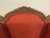 This extremely comfortable armchair has been recently upholstered in a warm red fabric. Beautiful, inviting addition to...