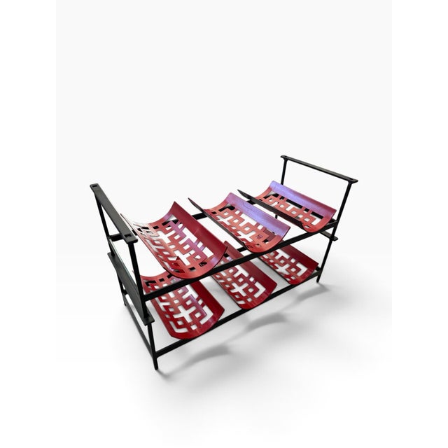 Bold geometry and clever modular design come together in this striking vintage Mid-Century Modern stackable wine rack....