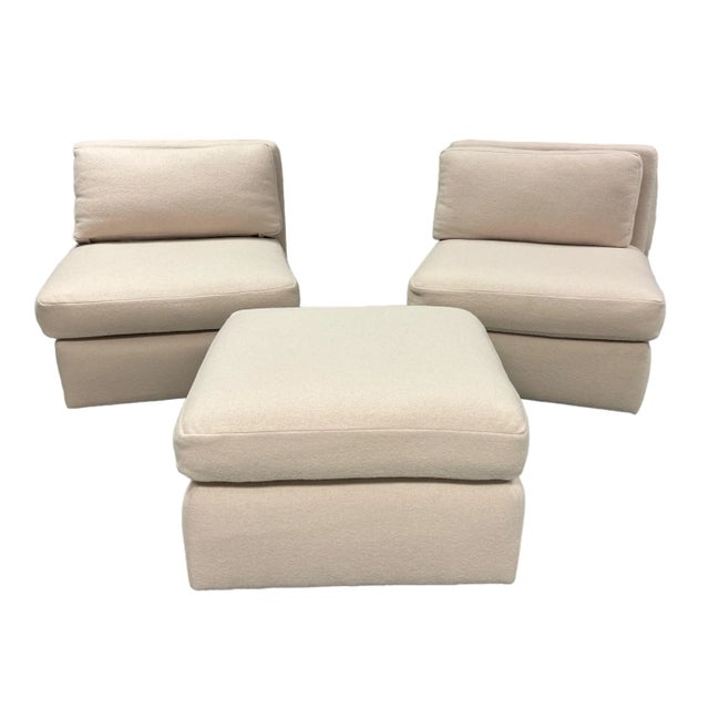 John Mascheroni slipper chairs and ottoman. Freshly upholstered in an exceptional Loro Piana Boiled wool. Neutral off...