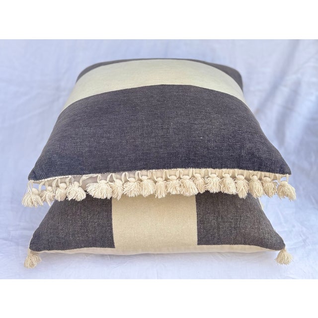 They are called classics for a reason. There is something so soothing about clean grey and ivory striped throw pillows....
