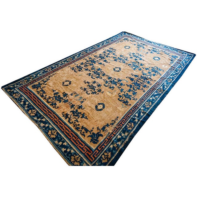 This late 19th-century Antique Chinese Ningxia rug eatures a 5' 10" x 10' hand-knotted wool pile on an ivory field. The...