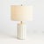 With a wide, repeating ribbed pattern and antiqued reactive glaze, this lamp brings the character. The wellscaled linen...