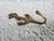 A brass anchor hook, measuring 5 1/2" x 2 1/2" x 1 1/2". Wouldn't it look lovely in a coastal or preppy home?