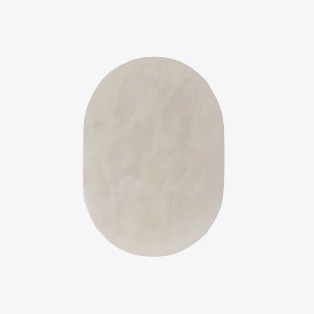 Our Mosman Curve alabaster wall sconce features a smooth disc of alabaster carved into a convex shape with a discreet...