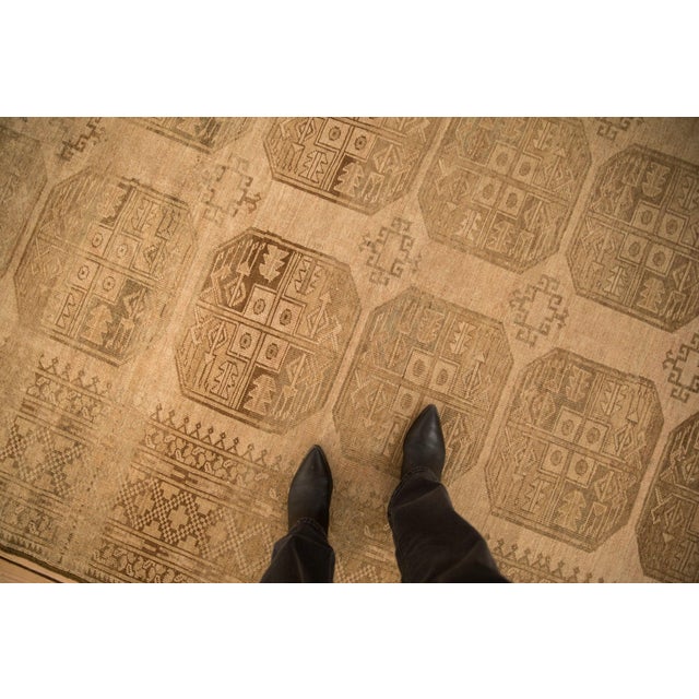 :: Columns and rows of oversized elephant footprint geometric floral guls with interior pawn design motif and multiple...